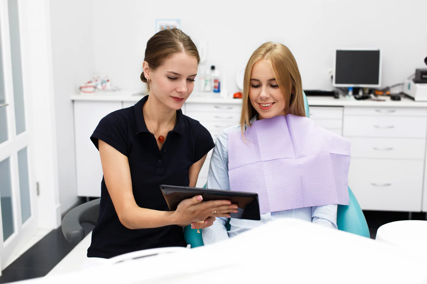 Custom mouthguards appointment discussion at Signature Dental
