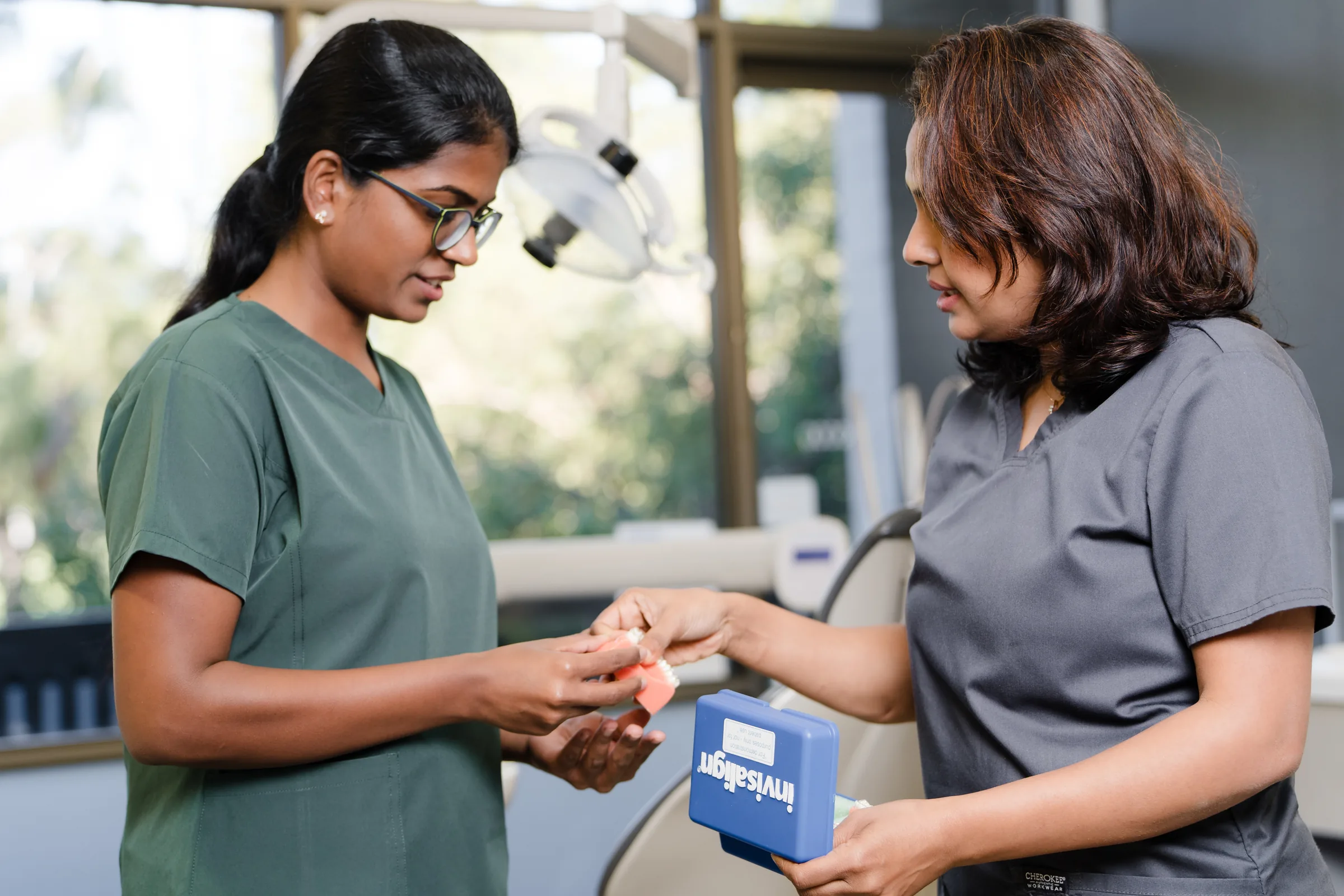 Dentist discussing clear aligner orthodontic planning with a patient