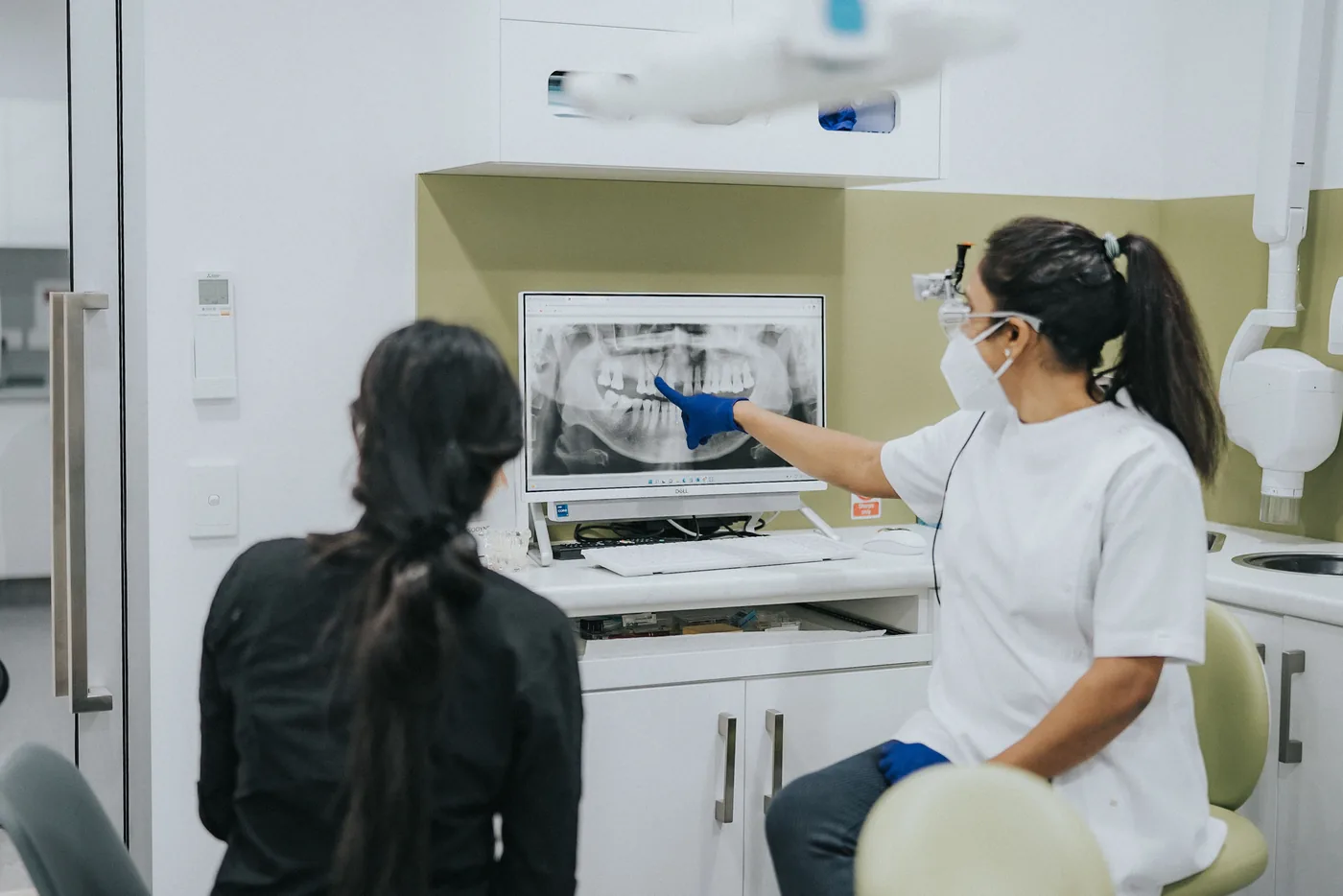 Dentist explaining sleep dentistry planning
